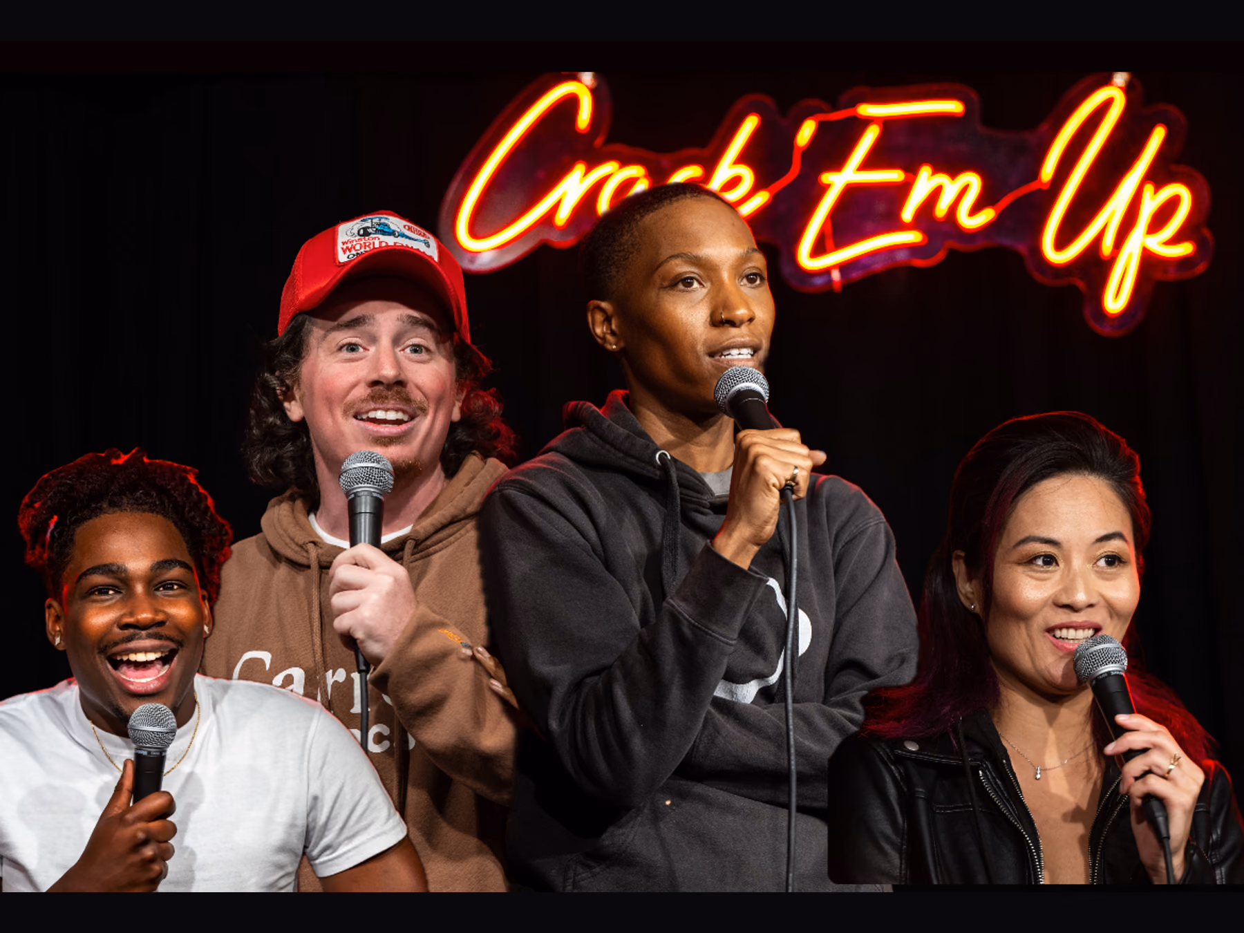 Four Crack'Em Up comedians holding microphones beneath the neon sign